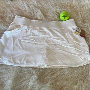 NEW WITH TAGS! Reebok Tennis Skort with two front pockets & compression shorts